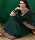 Green polka dot zari woven kanjeevaram saree with blouse
