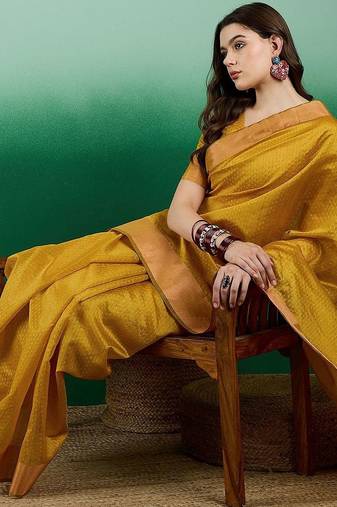 Mustard polka dot zari woven tassel detail saree with blouse