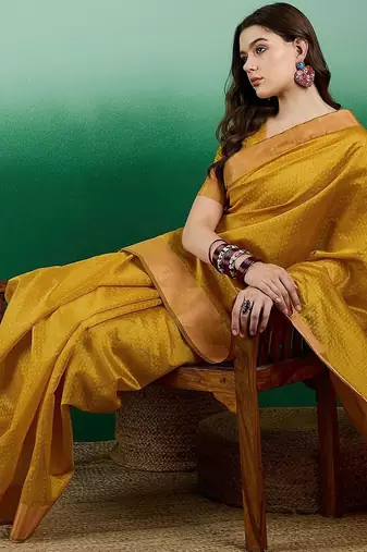Mustard polka dot zari woven tassel detail saree with blouse