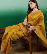 Mustard polka dot zari woven tassel detail saree with blouse
