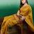 Mustard polka dot zari woven tassel detail saree with blouse