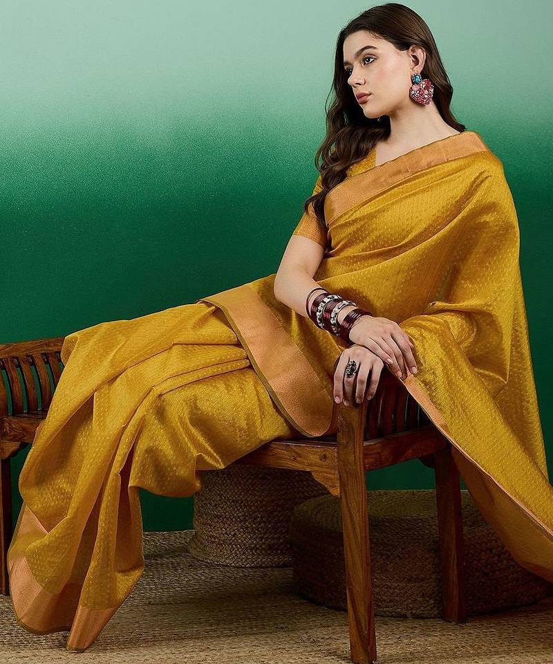 Mustard polka dot zari woven tassel detail saree with blouse