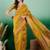 Mustard polka dot zari woven tassel detail saree with blouse