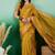 Mustard polka dot zari woven tassel detail saree with blouse