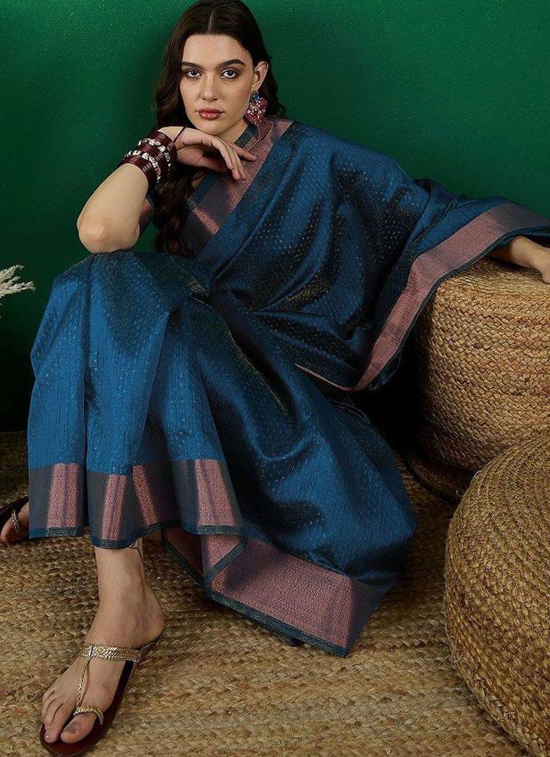 Teal polka dot zari woven tassel detail saree with blouse