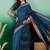 Teal polka dot zari woven tassel detail saree with blouse