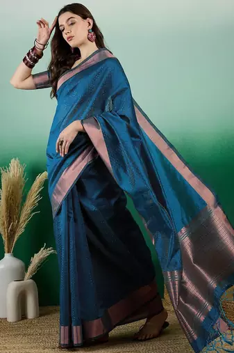 Teal polka dot zari woven tassel detail saree with blouse