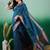 Teal polka dot zari woven tassel detail saree with blouse