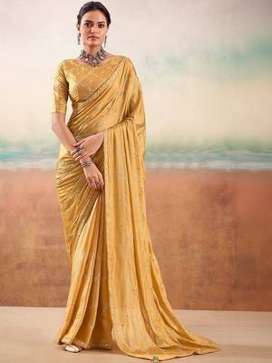 Yellow ethnic embellished festive wear saree with matching blouse 1