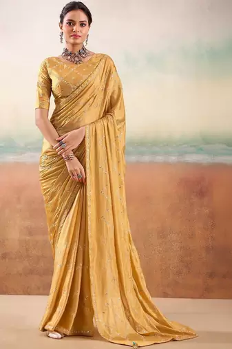 Yellow ethnic embellished festive wear saree with matching blouse