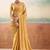 Yellow ethnic embellished festive wear saree with matching blouse