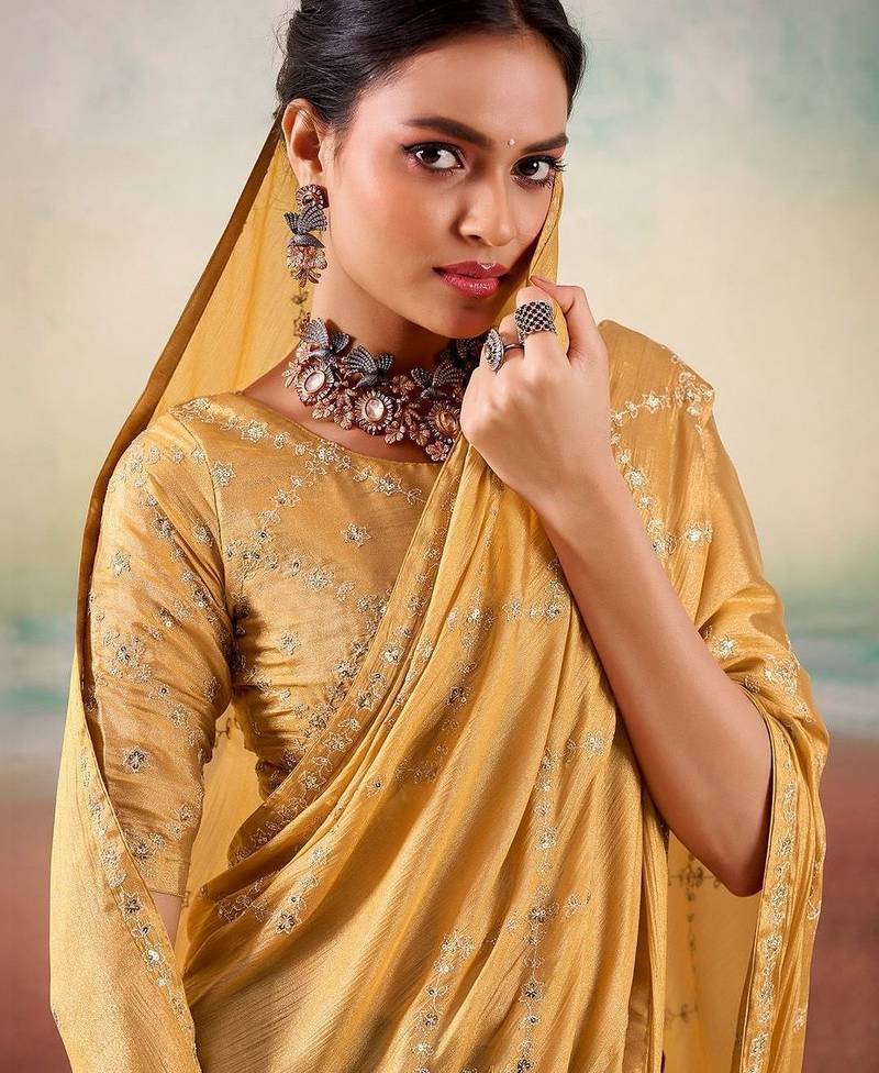 Yellow ethnic embellished festive wear saree with matching blouse