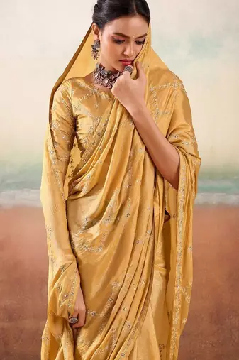 Yellow ethnic embellished festive wear saree with matching blouse