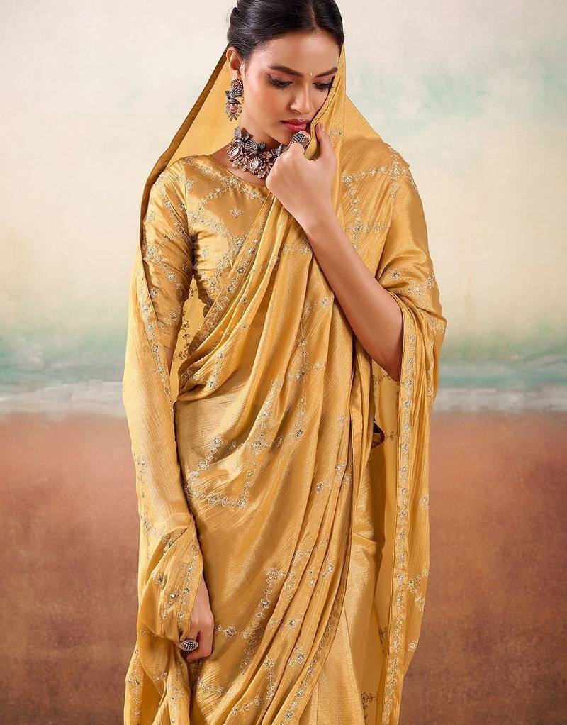 Yellow ethnic embellished festive wear saree with matching blouse
