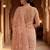 Peach floral embroidered net designer saree