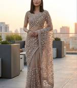 Beige floral embroidered net designer saree