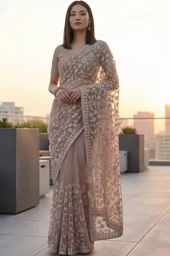 Beige floral embroidered net designer saree