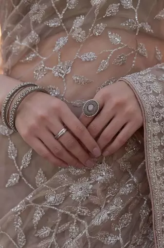 Beige floral embroidered net designer saree