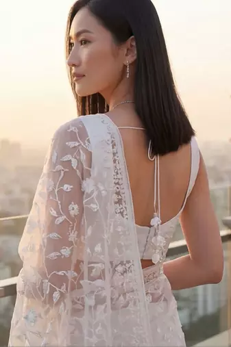 White embellished embroidered net designer saree