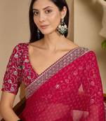 Pink floral embroidered poly georgette saree with unstiched blouse piece