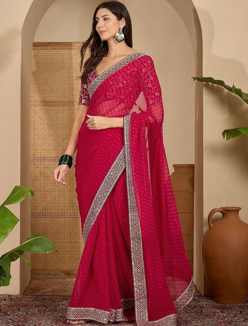Pink floral embroidered poly georgette saree with unstiched blouse piece