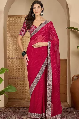 Pink floral embroidered poly georgette saree with unstiched blouse piece