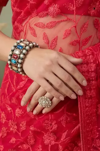 Red embellished embroidered net designer saree