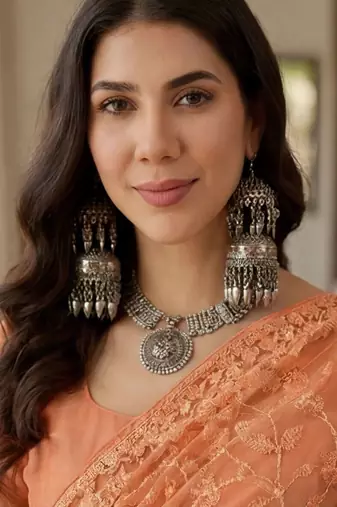 Peach floral embroidered net designer saree