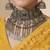 Mustard floral embroidered net designer saree