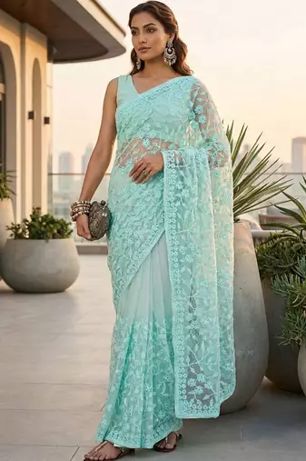 Turquoise embellished embroidered net designer saree