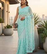 Turquoise embellished embroidered net designer saree