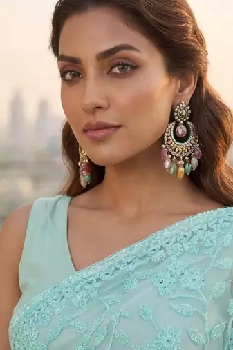 Turquoise embellished embroidered net designer saree