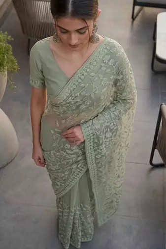 Sea green embellished embroidered net designer saree