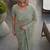 Sea green embellished embroidered net designer saree