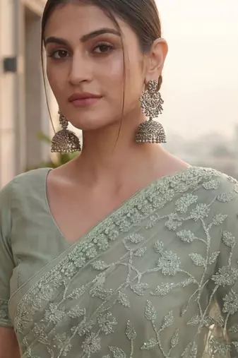 Sea green embellished embroidered net designer saree