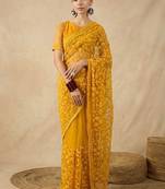 Yellow floral embroidered net designer saree