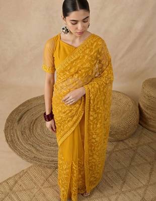 Yellow floral embroidered net designer saree 3