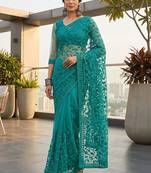 Teal embellished embroidered net designer saree