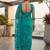 Teal embellished embroidered net designer saree