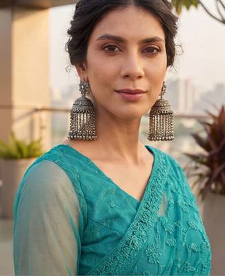 Teal embellished embroidered net designer saree 5
