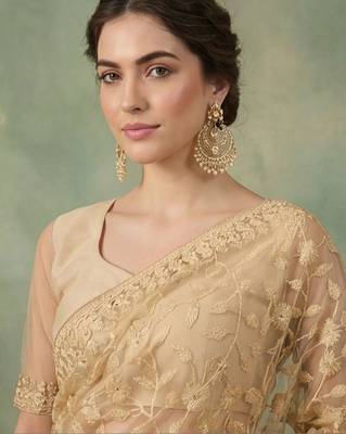Gold embellished embroidered net designer saree 5