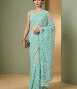 Turquoise embellished embroidered net designer saree