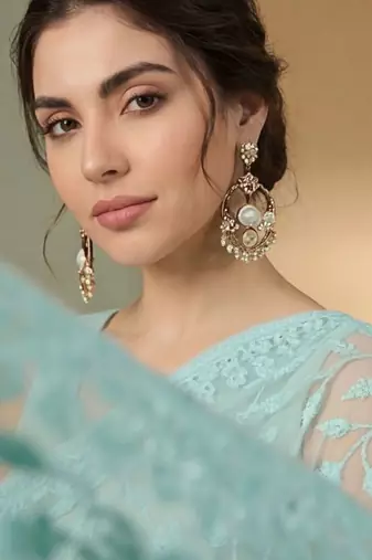 Turquoise embellished embroidered net designer saree