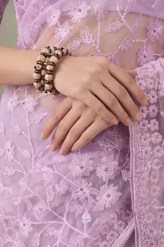 Lavender embellished embroidered net designer saree