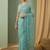 Sea green floral embroidered net designer saree
