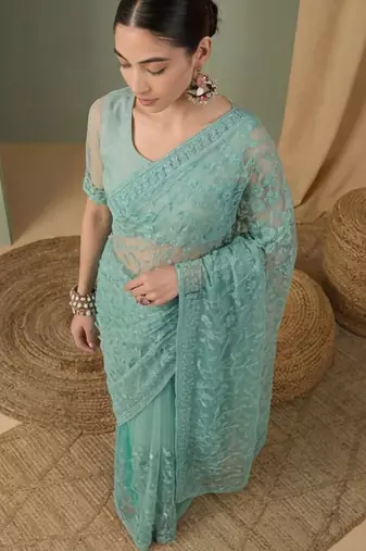 Sea green floral embroidered net designer saree