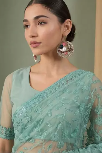 Sea green floral embroidered net designer saree