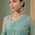 Sea green floral embroidered net designer saree