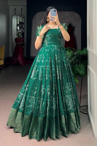 Mesmerizing Green Zari Weaving Cotton Function Wear Gown