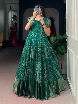 Mesmerizing Green Zari Weaving Cotton Function Wear Gown 3